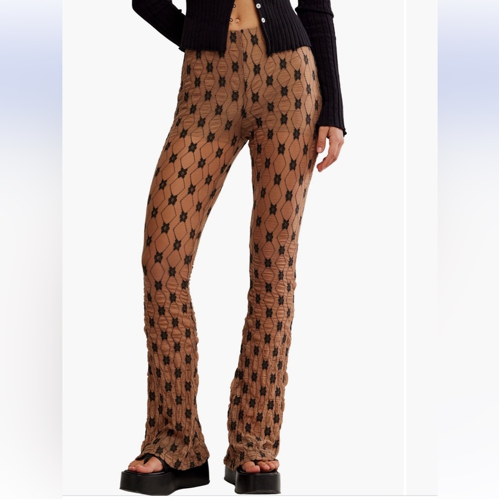 FREE PEOPLE NWT size Medium
Margo lace overlay flare pants